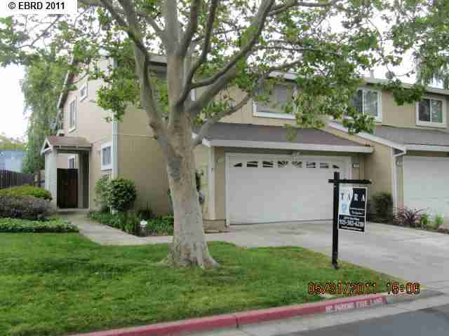 131 Sea Point Way Pittsburg, CA 94565 - Photo 1 of 1 a front view of a house with garden