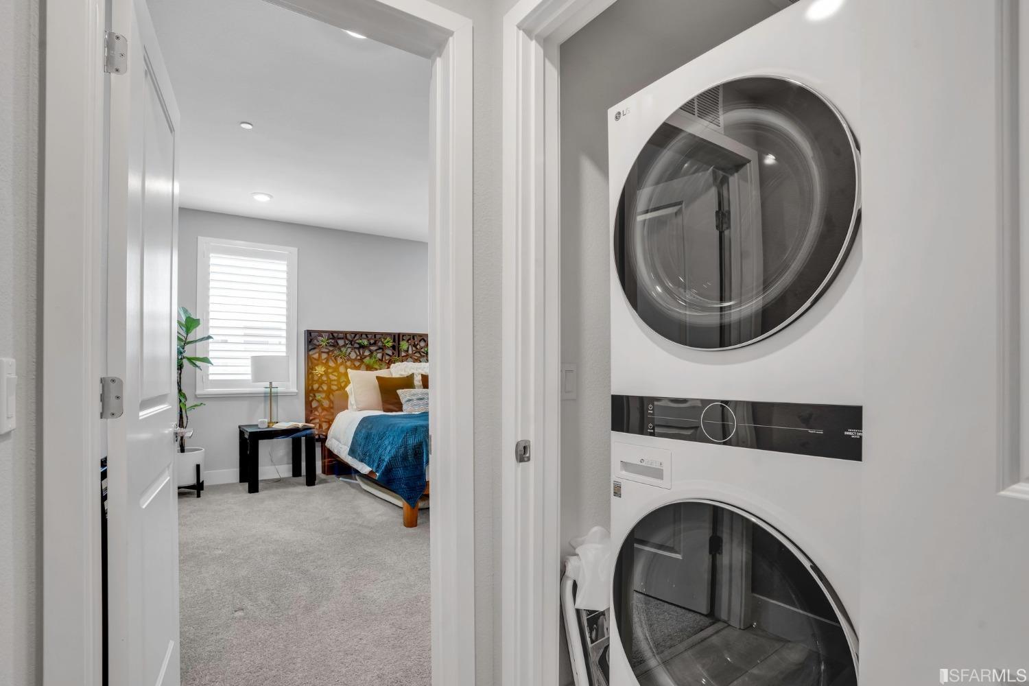 444 Trace Lane Hayward, CA 94544 - Photo 25 of 33 a view of a hallway with washer and dryer