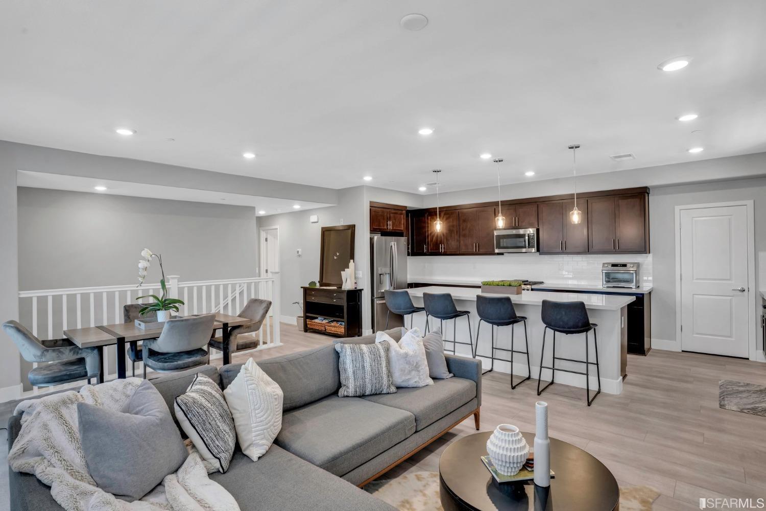 444 Trace Lane Hayward, CA 94544 - Photo 7 of 33 a living room with furniture and kitchen view