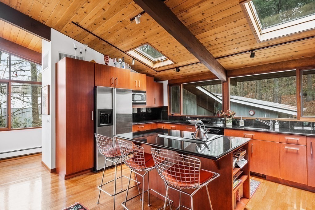 61 Scotch Pine Road Weston, MA 02493 - Photo 12 of 39 a outdoor space with swimming pool and furniture