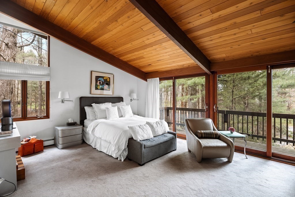 61 Scotch Pine Road Weston, MA 02493 - Photo 19 of 39 a spacious bedroom with furniture and windows