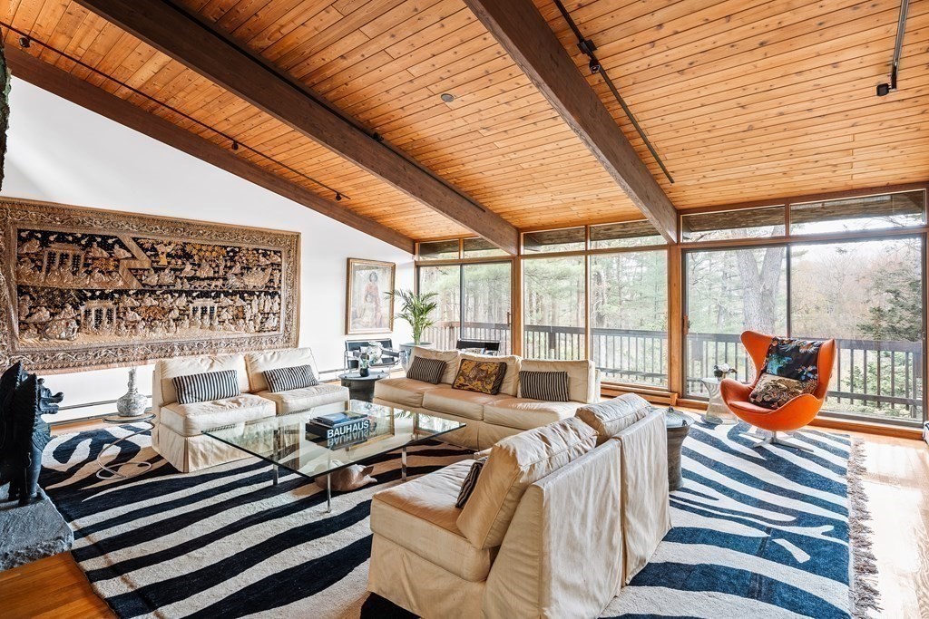 61 Scotch Pine Road Weston, MA 02493 - Photo 2 of 39 a living room with furniture and a large window