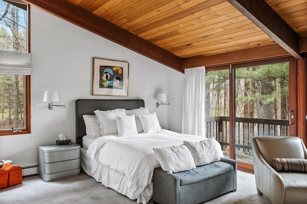 61 Scotch Pine Road Weston, MA 02493 - Photo 21 of 39 a bedroom with furniture and a large window
