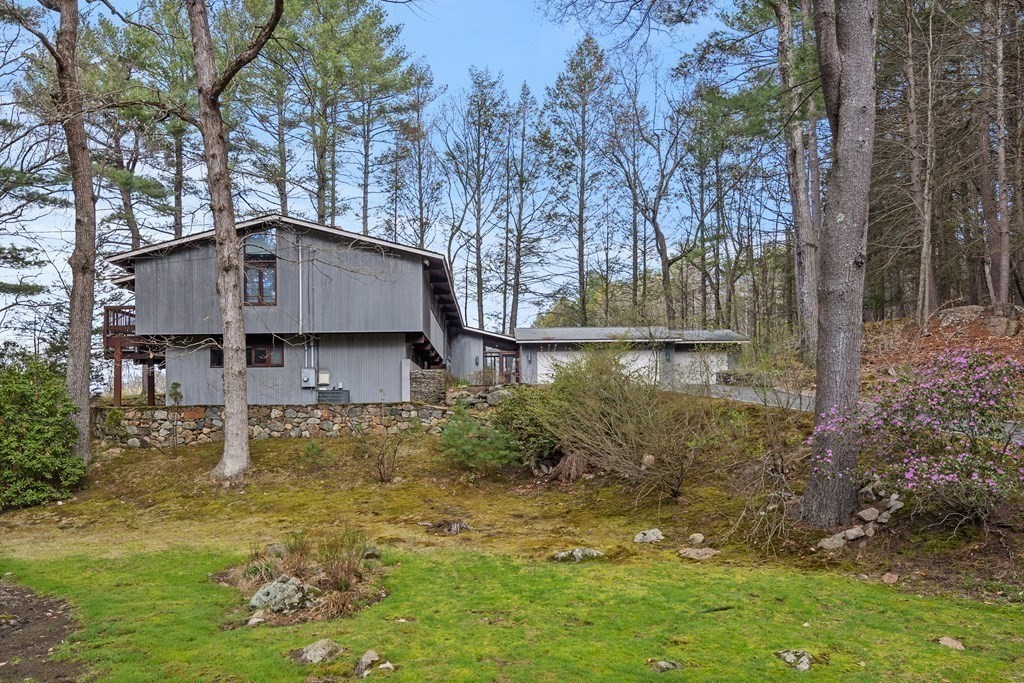 61 Scotch Pine Road Weston, MA 02493 - Photo 36 of 39 a house that has yard in front of it