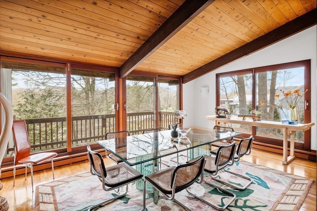 61 Scotch Pine Road Weston, MA 02493 - Photo 7 of 39 a living room with furniture and a large window