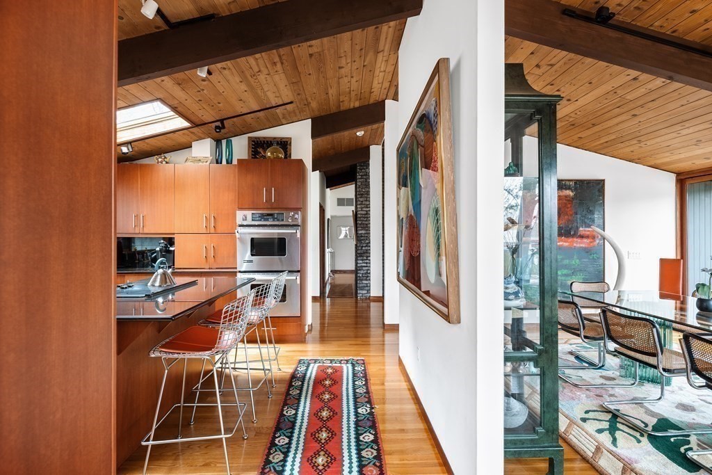 61 Scotch Pine Road Weston, MA 02493 - Photo 10 of 39 a view of a living room with a fireplace