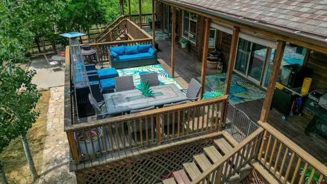 a view of balcony with wooden stairs