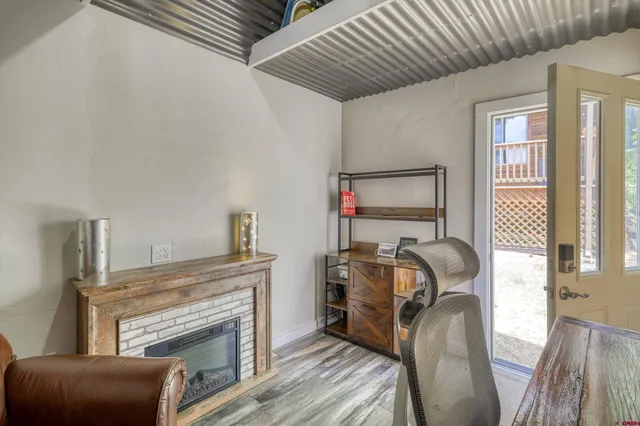 a blue wall with a couch