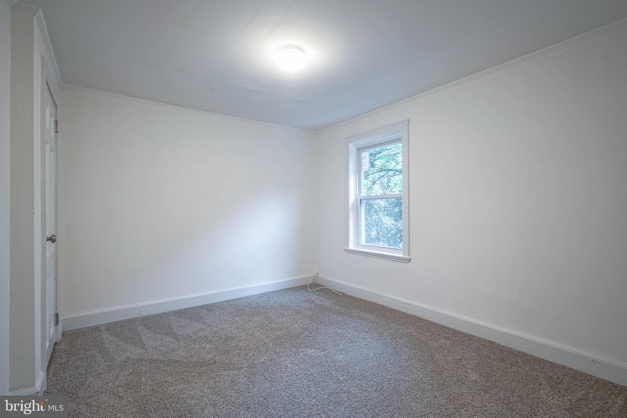 1662 Minnesota Road Camden, NJ 08104 - Photo 12 of 22 an empty room with windows