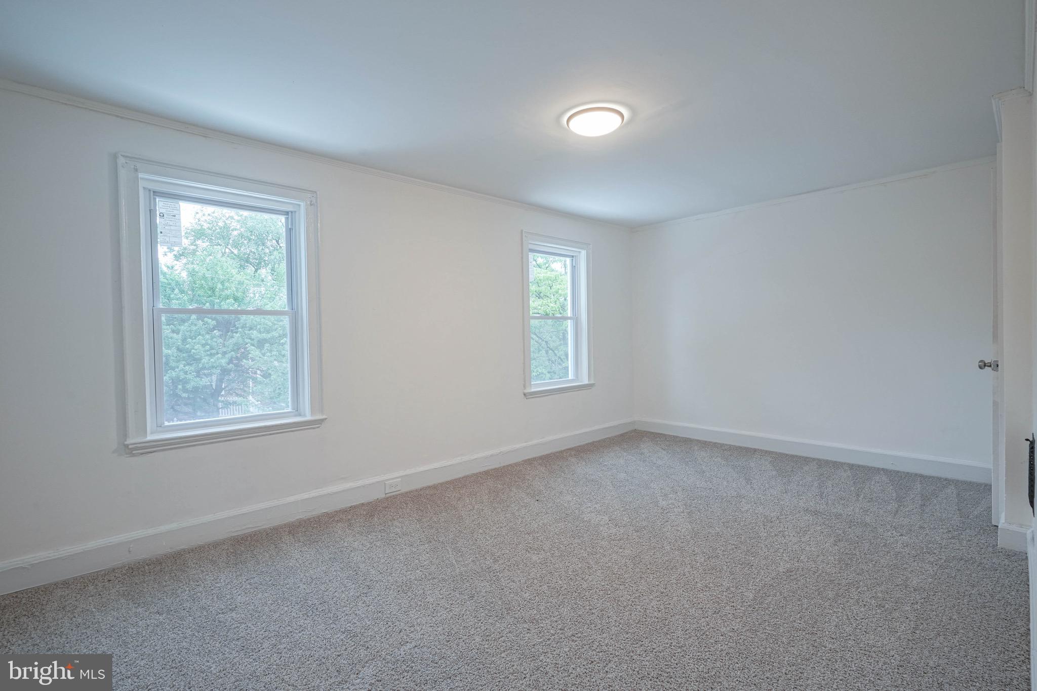1662 Minnesota Road Camden, NJ 08104 - Photo 14 of 22 an empty room with windows