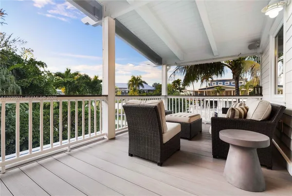 a view of a porch with furniture