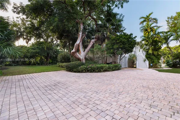 a view of backyard with green space