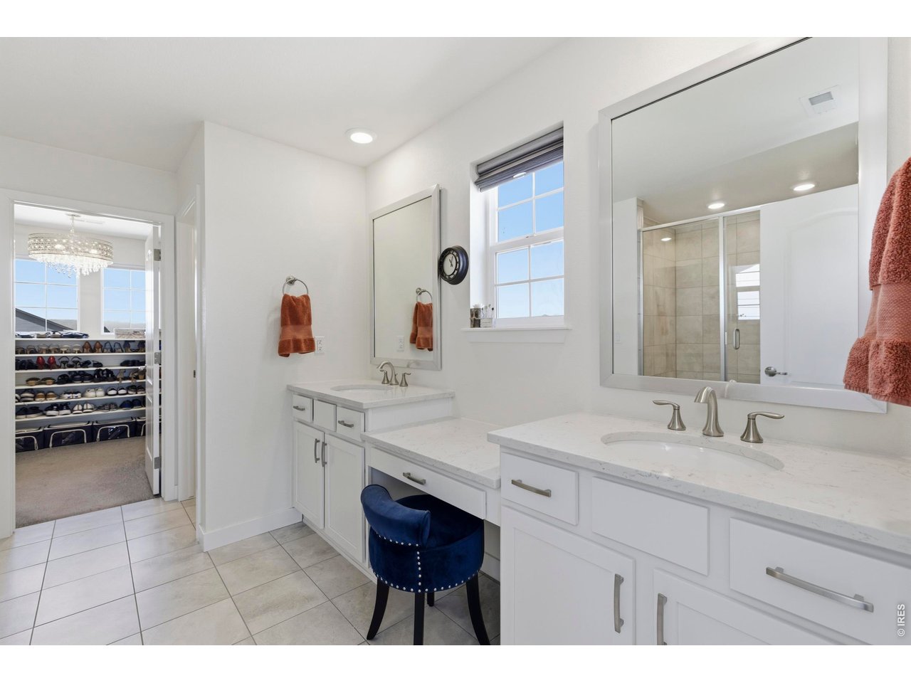 2910 Water View Street Timnath, CO 80547 - Photo 24 of 50 a spacious bathroom with a sink double vanity and a mirror