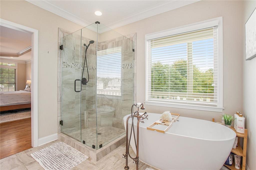 92 River Walk Parkway Euharlee, GA 30145 - Photo 24 of 53 a bathroom with a tub shower and sink