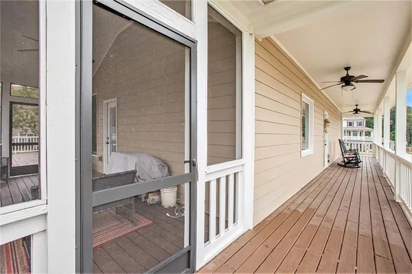 a view of front door deck and patio