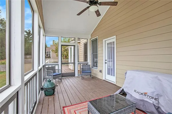 a house view with swimming pool in front of it