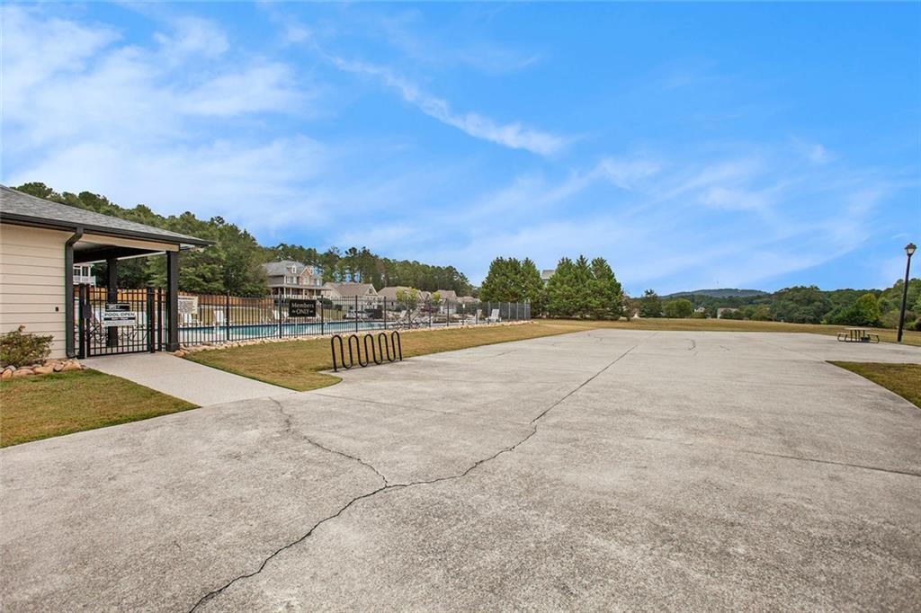 92 River Walk Parkway Euharlee, GA 30145 - Photo 38 of 53 a view of a lake with a big yard