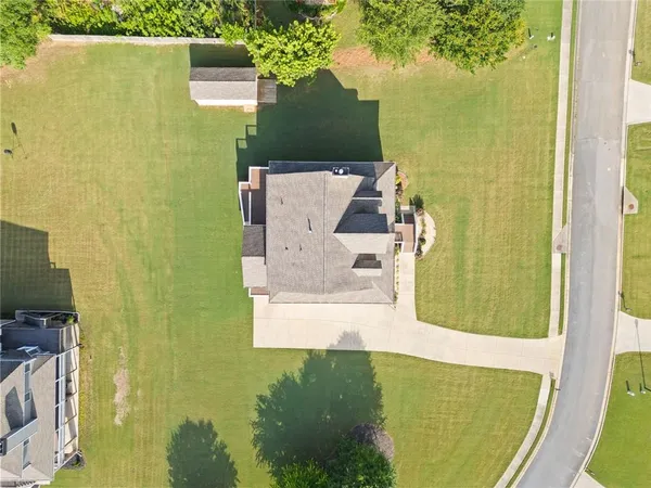 a view of a lake with a yard