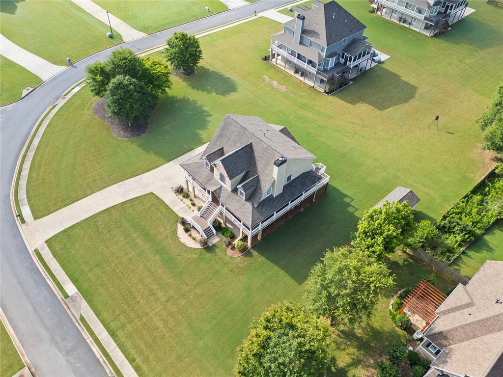 92 River Walk Parkway Euharlee, GA 30145 - Photo 47 of 53 a view of a lake with a yard