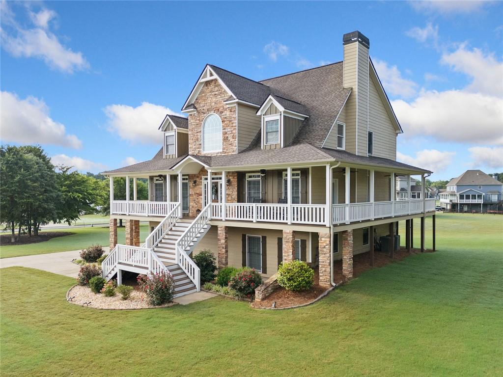 92 River Walk Parkway Euharlee, GA 30145 - Photo 48 of 53 a front view of a house with a yard table and chairs