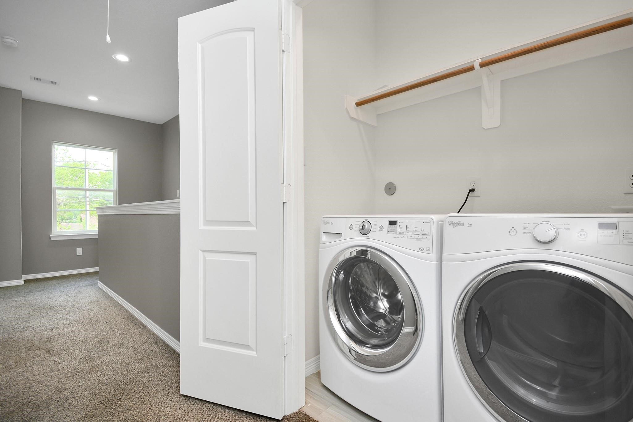 3019 Elysian Street Houston, TX 77009 - Photo 29 of 33 a view of a hallway with washer and dryer
