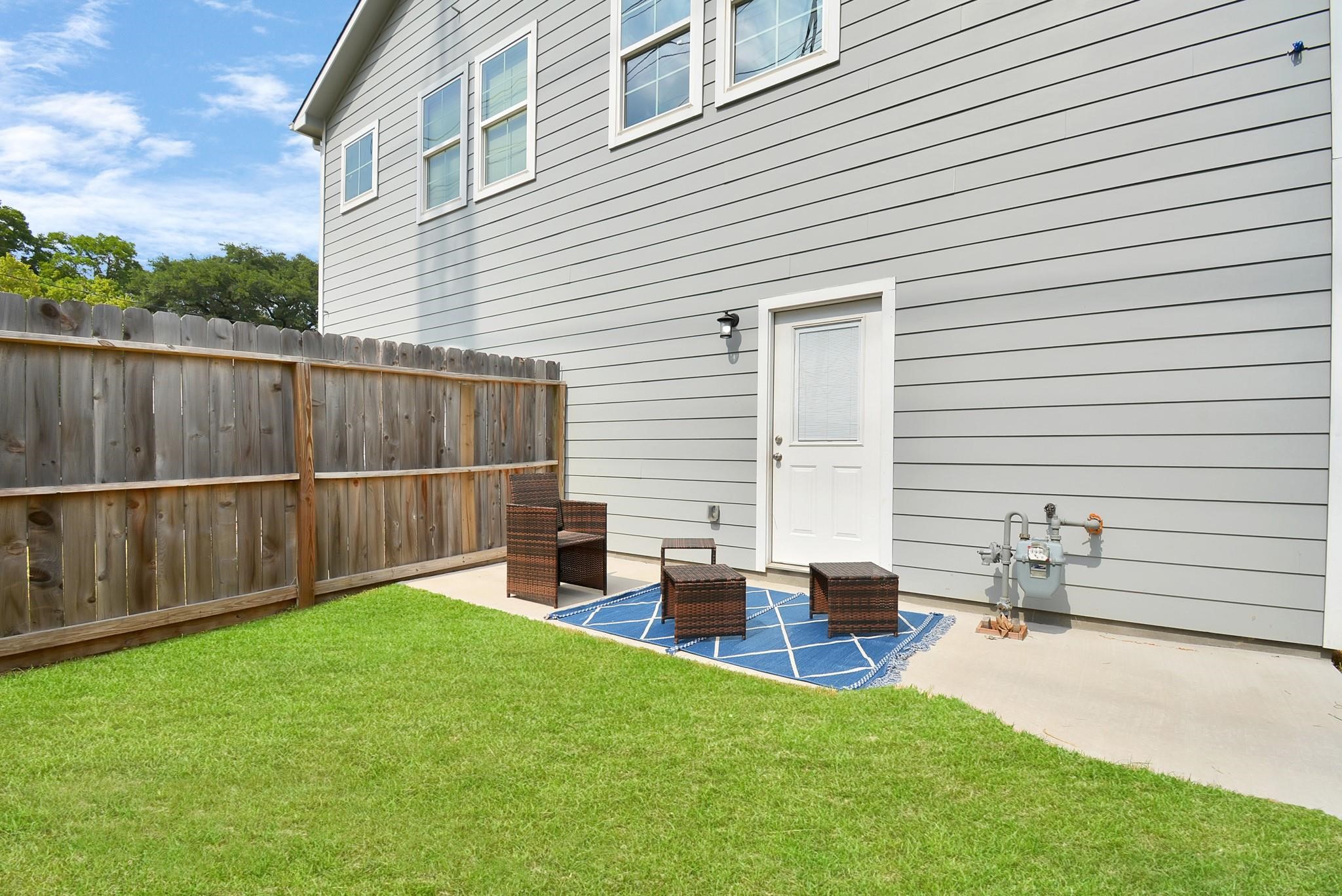 3019 Elysian Street Houston, TX 77009 - Photo 30 of 33 a view of backyard with outdoor seating and plants