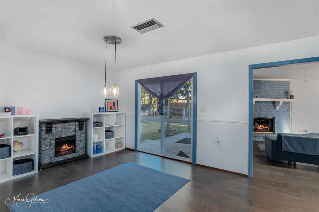 3304 Gorton Road Shreveport, LA 71119 - Photo 11 of 21 a view of a livingroom with furniture and fireplace