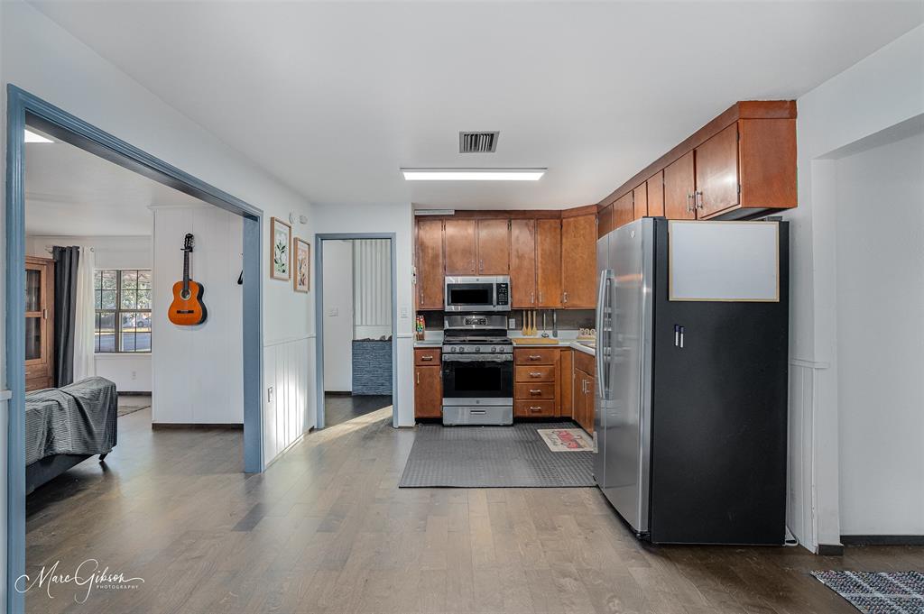 3304 Gorton Road Shreveport, LA 71119 - Photo 12 of 21 a kitchen with a refrigerator and a refrigerator
