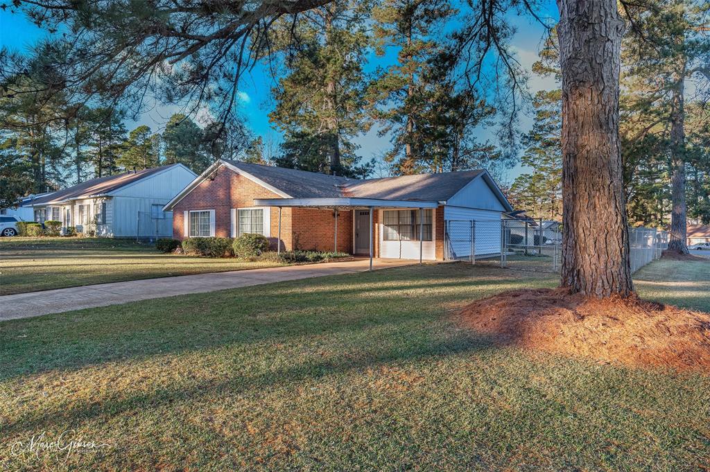 3304 Gorton Road Shreveport, LA 71119 - Photo 21 of 21 a front view of a house with a yard