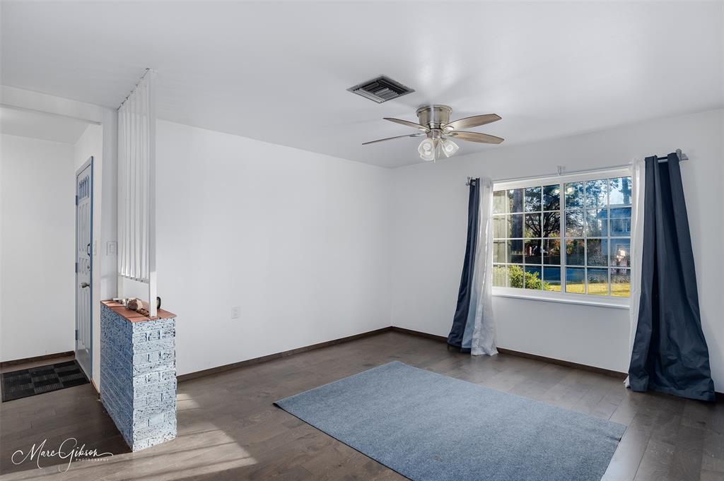 3304 Gorton Road Shreveport, LA 71119 - Photo 3 of 21 an empty room with windows