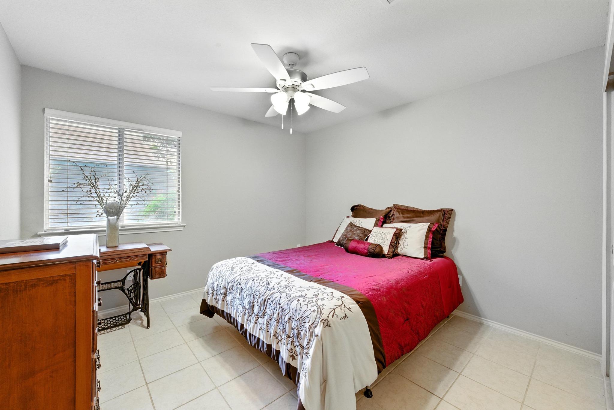 9602 Tea Rose Trail Austin, TX 78748 - Photo 21 of 27 Bedroom featuring baseboards and ceiling fan