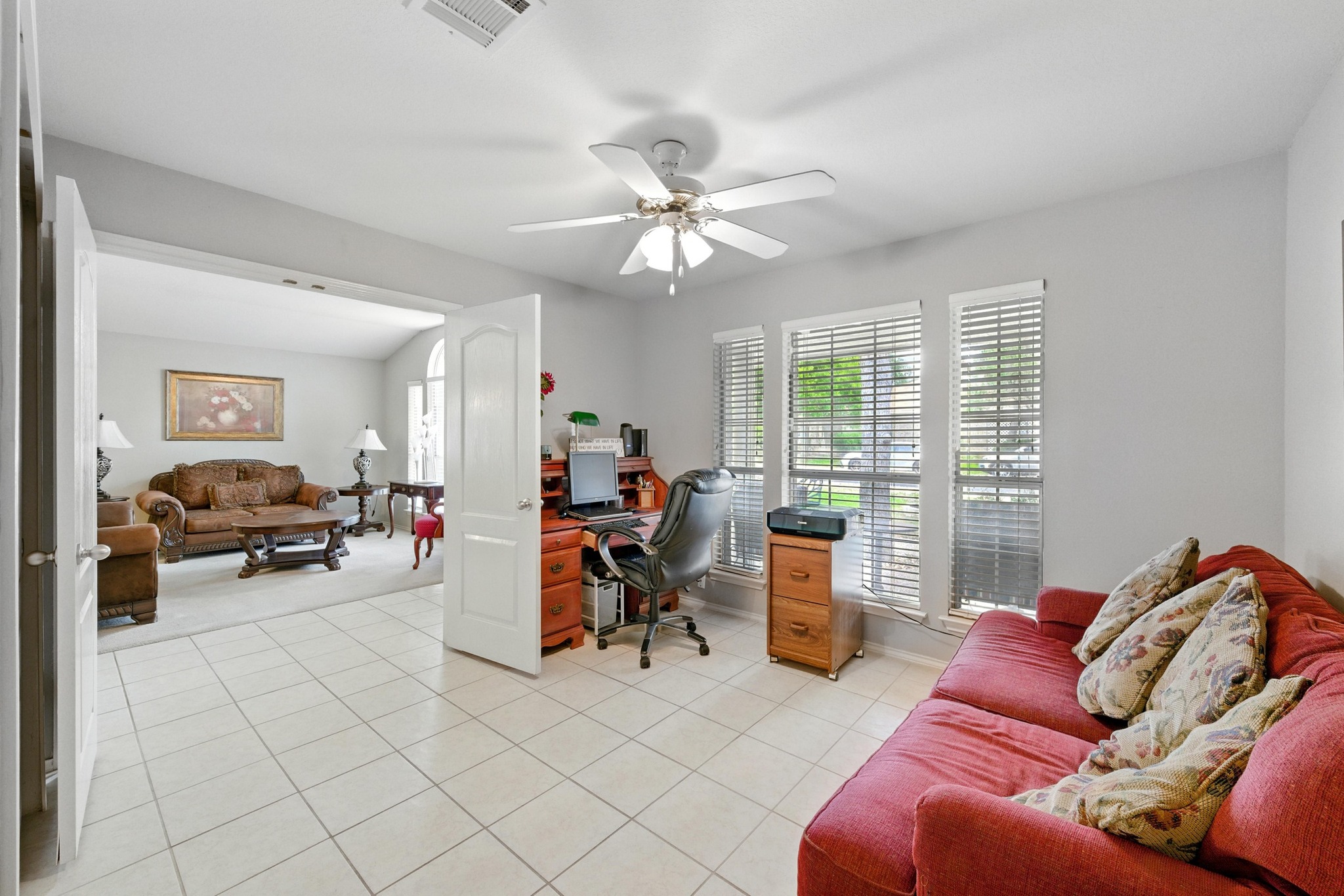 9602 Tea Rose Trail Austin, TX 78748 - Photo 23 of 27 Office featuring healthy amount of natural light, a ceiling fan, and light tile patterned floors