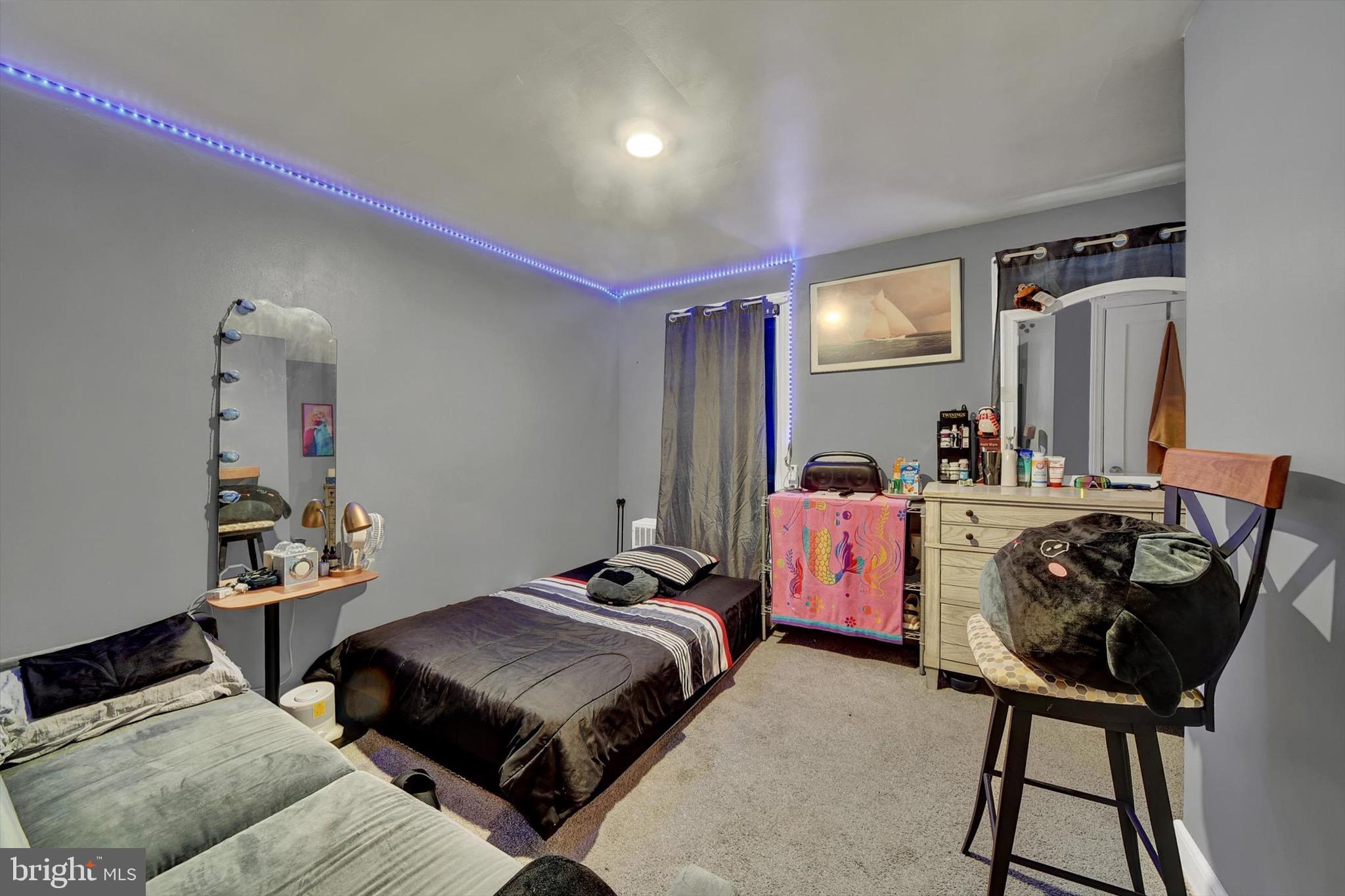 3552 Benzinger Road Baltimore, MD 21229 - Photo 10 of 23 a bedroom with furniture and a bed