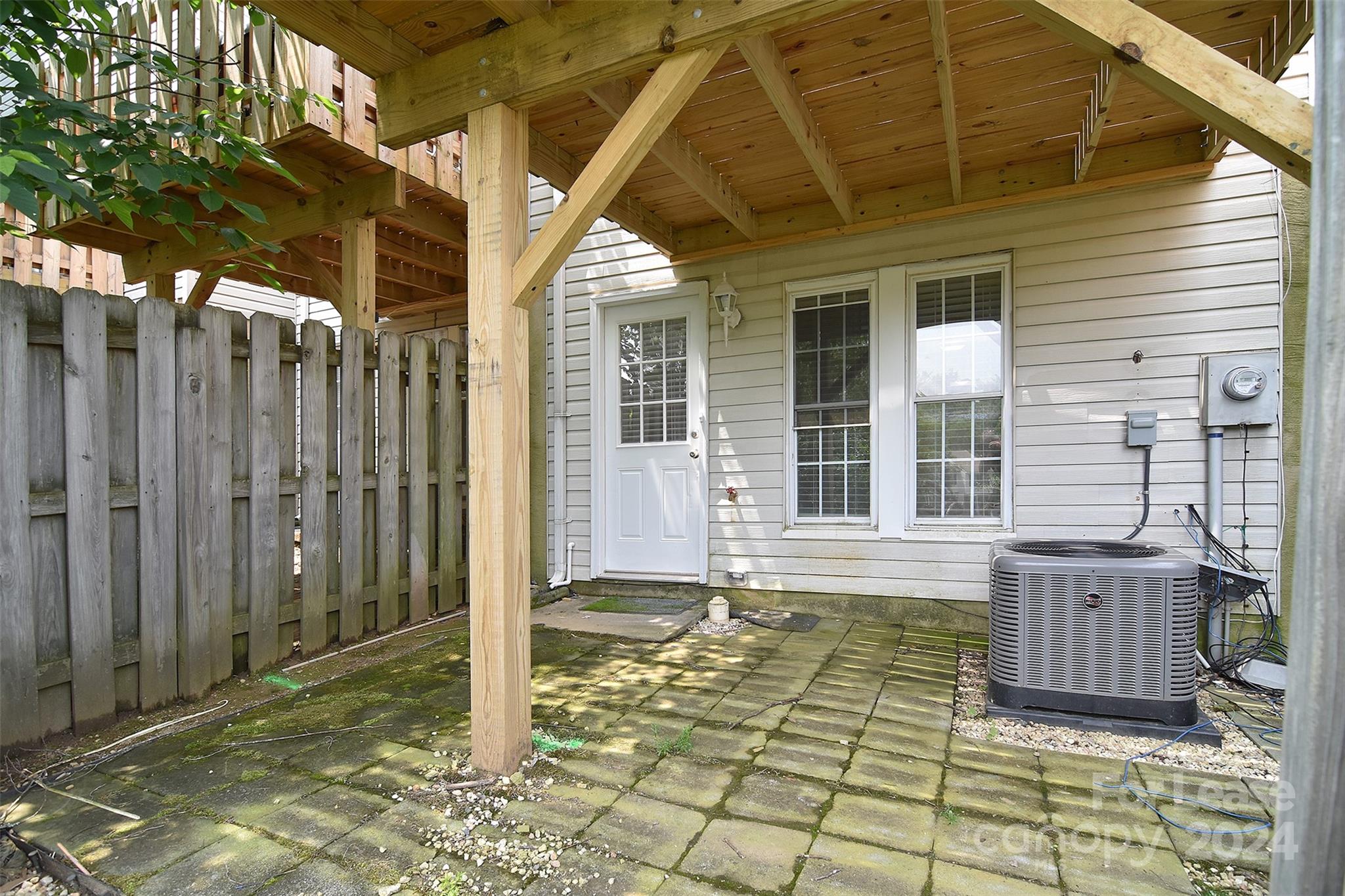 660 Lex Drive Charlotte, NC 28262 - Photo 16 of 16 a view of a house with backyard and wooden fence