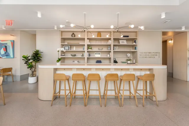 a room with a table and chairs