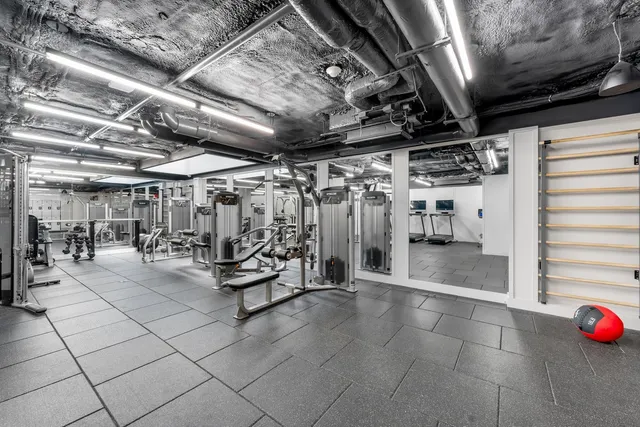a view of a room with gym equipment