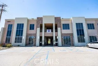 a view of a building with a street