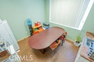 a bathroom with a sink mirror and toilet