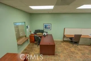 a view of a workspace with furniture