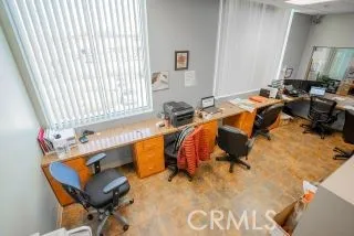 a bed room with furniture and a wooden floor