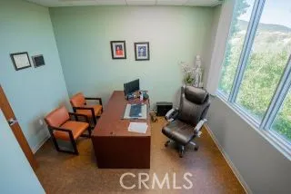 front view of a house with a garden