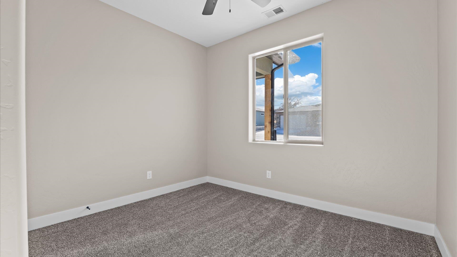2642 B B 1/2 Road Grand Junction, CO 81503 - Photo 15 of 25 an empty room with a window