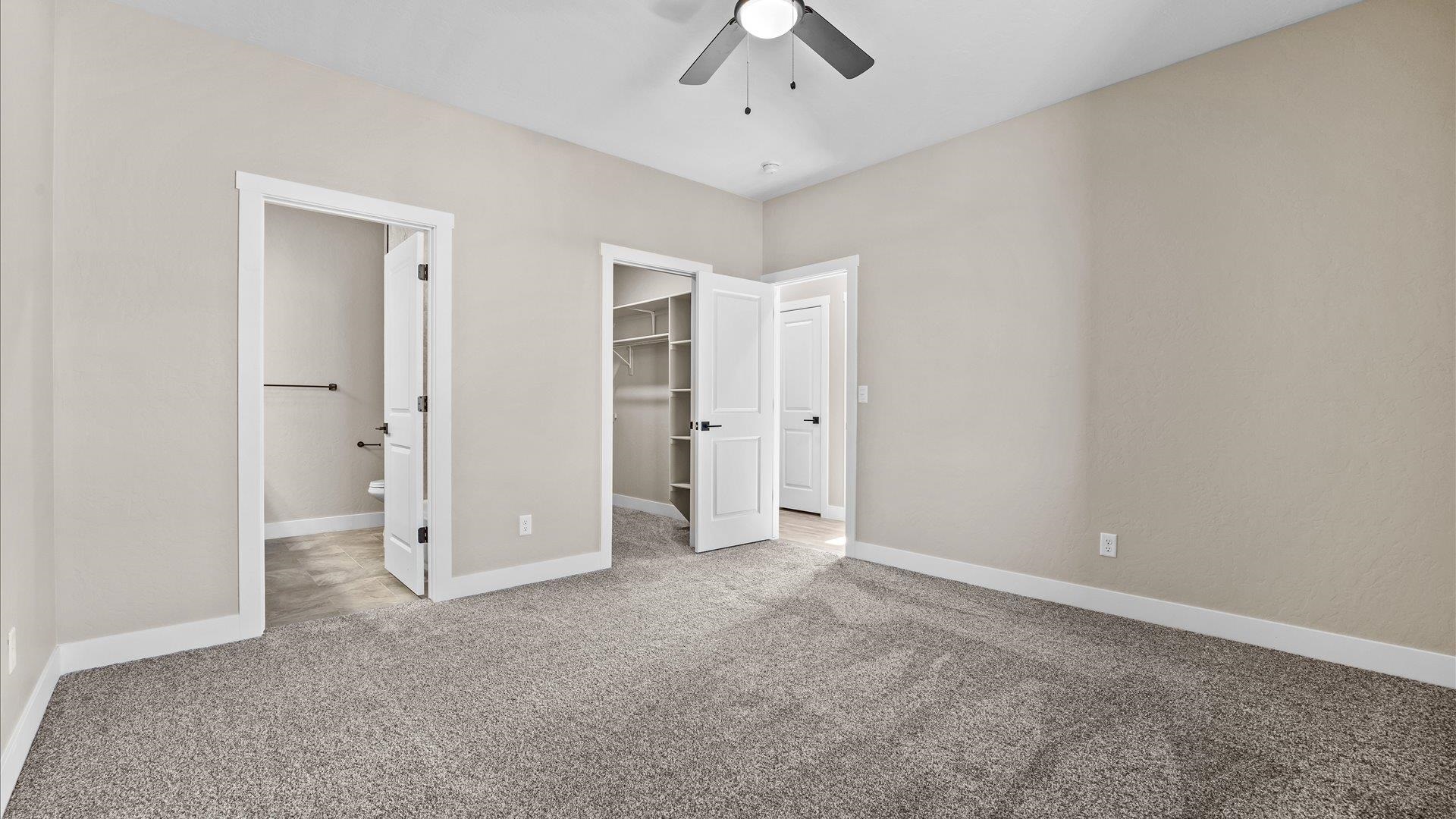 2642 B B 1/2 Road Grand Junction, CO 81503 - Photo 21 of 25 an empty room with a ceiling fan and shower