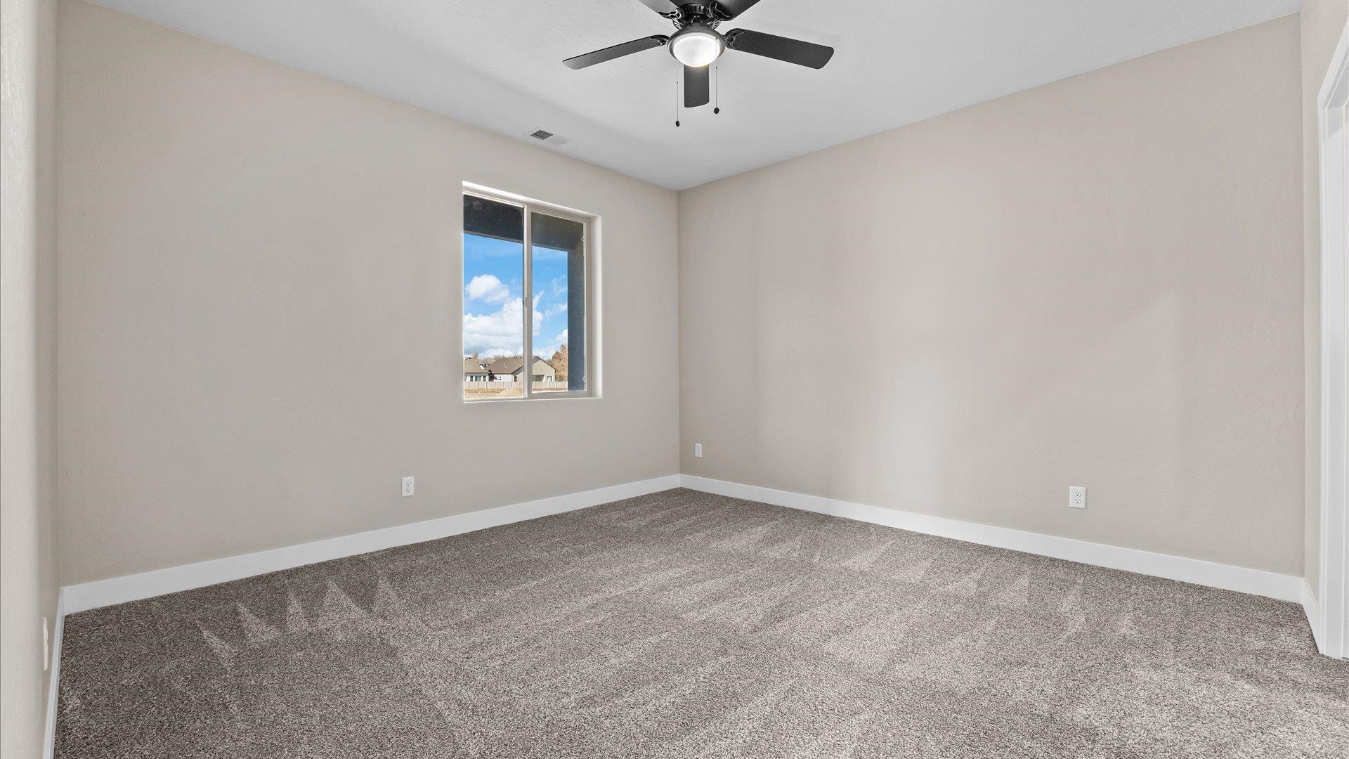2642 B B 1/2 Road Grand Junction, CO 81503 - Photo 22 of 25 a view of an empty room with a window