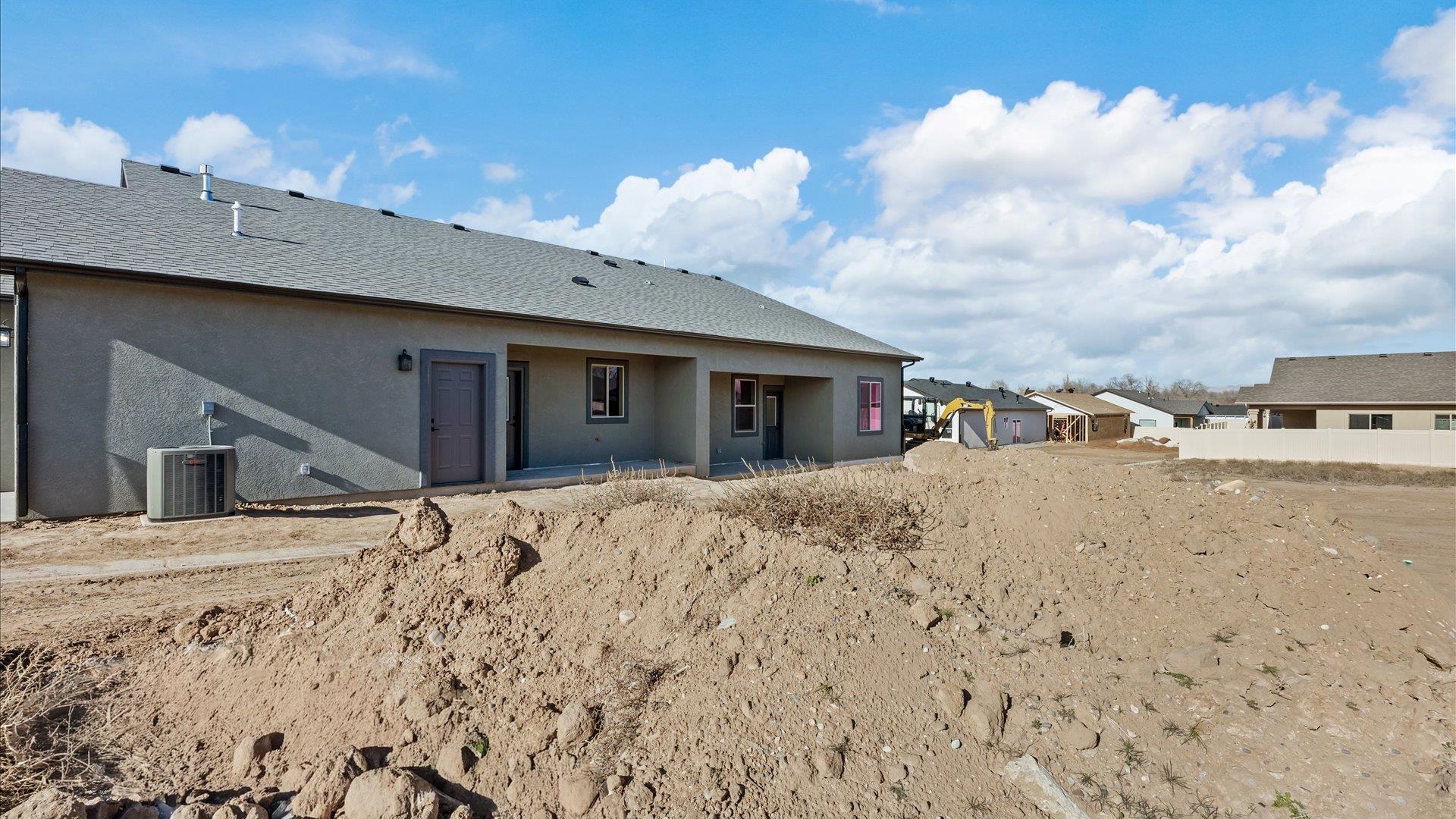 2642 B B 1/2 Road Grand Junction, CO 81503 - Photo 4 of 25 a view of the house with palm trees