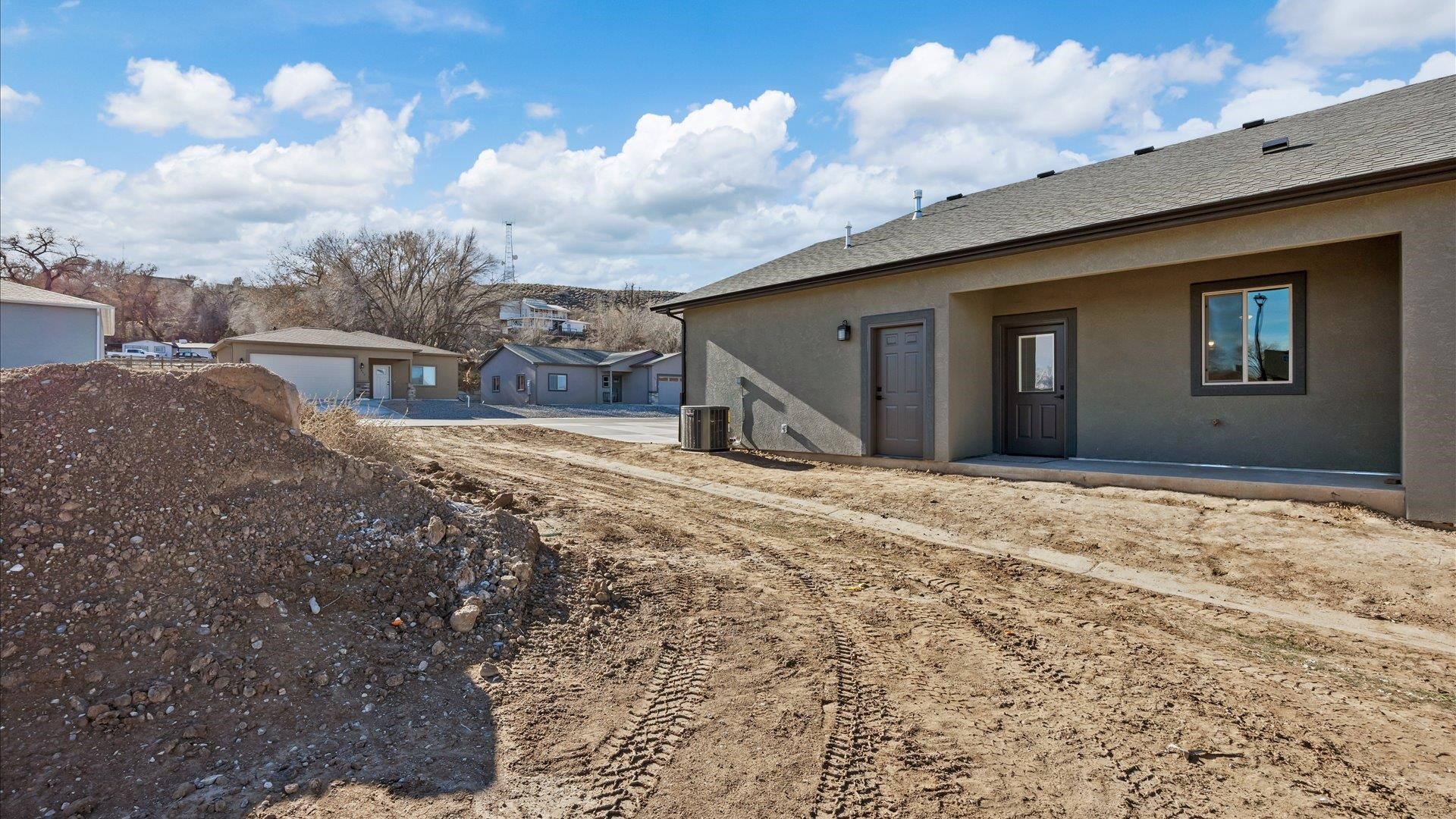 2642 B B 1/2 Road Grand Junction, CO 81503 - Photo 5 of 25 a view of a house with a snow in the yard