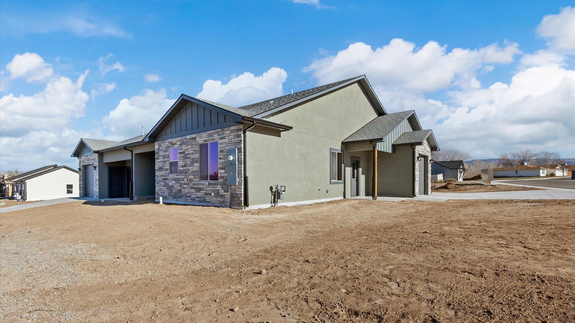 2642 B B 1/2 Road Grand Junction, CO 81503 - Photo 6 of 25 a view of a house with a yard