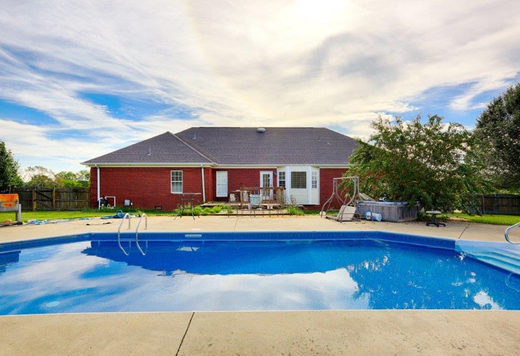 24 Henry Bayless Road Ardmore, TN 38449 - Photo 12 of 28 a view of pool with outdoor space and seating area