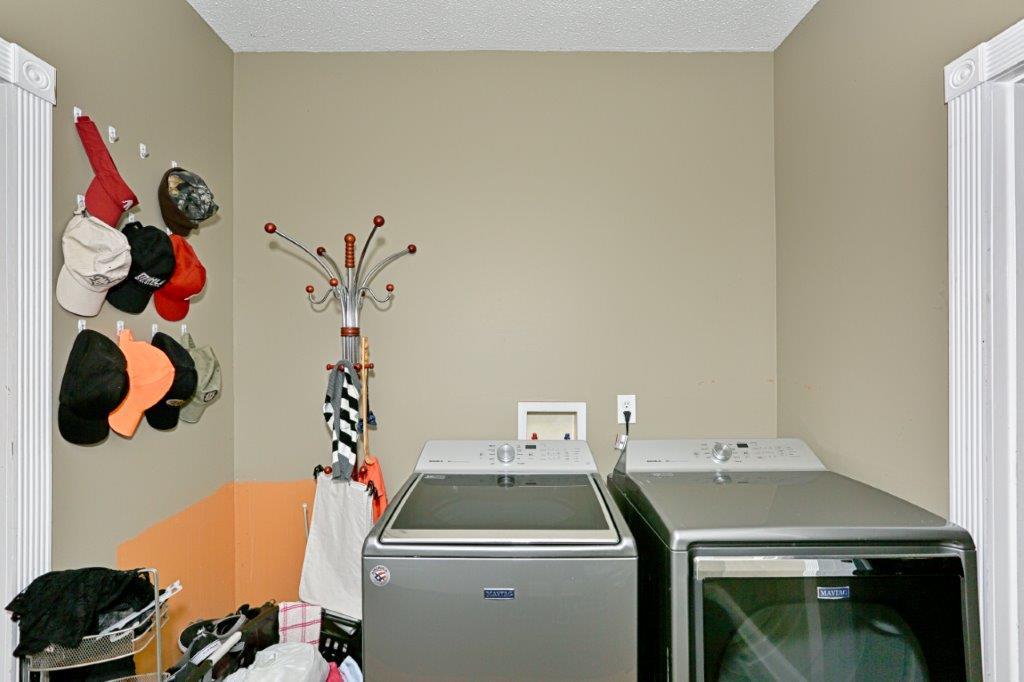 24 Henry Bayless Road Ardmore, TN 38449 - Photo 28 of 28 a utility room with dryer and washer