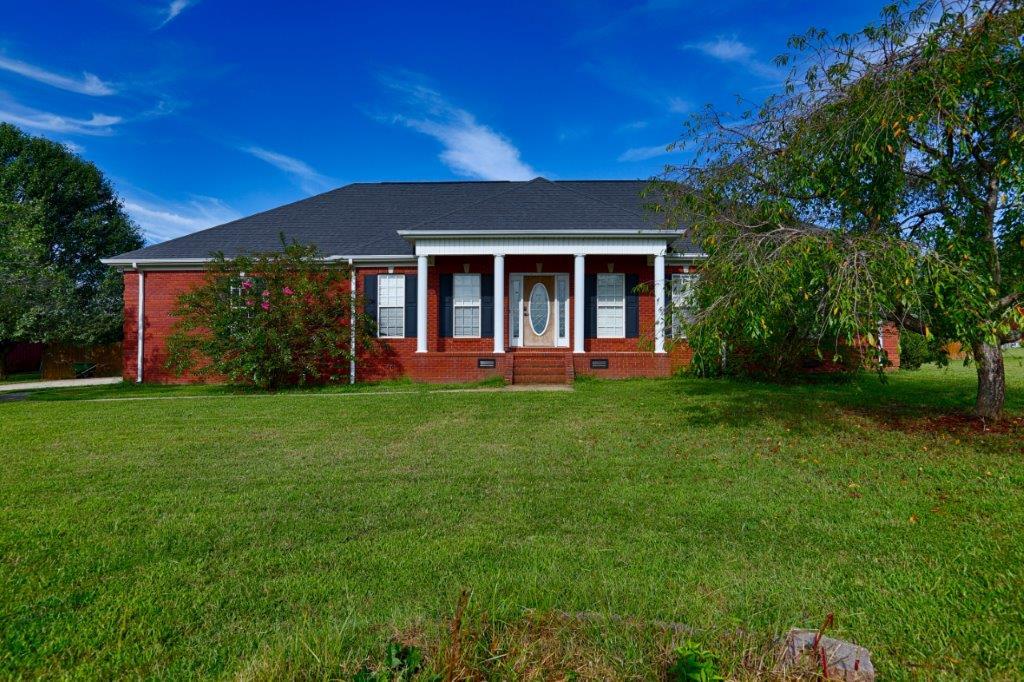 24 Henry Bayless Road Ardmore, TN 38449 - Photo 5 of 28 a view of a house with a yard